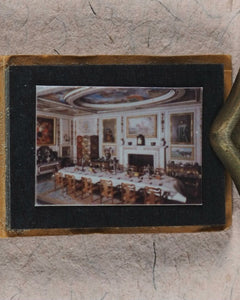 Photograph Album, miniature. Miniature photograph album of Her Royal Highness, Queen Mary's Dolls' House. Circa 1990.