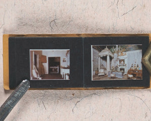 Photograph Album, miniature. Miniature photograph album of Her Royal Highness, Queen Mary's Dolls' House. Circa 1990.