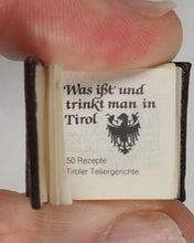 Load image into Gallery viewer, Kleinste Kochbuch der Welt. [Bolzano] Bozen. 1985. Smallest cookbook in the world. What do people eat and drink in Tyrol? 50 recipes for Tyrolean dishes. 2nd edition. 1985.
