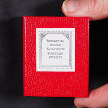 Load image into Gallery viewer, Levitan, Kalman. Miniature Books relating to Postage Stamps. Two volumes. 1983. with, Soliloquy of a Postage Stamp by Ernest W. Brady. Keepsake for Friends. 6 printed pages. 1978. Black Cat Press. Skokie. Illinois. Dos-a-dos-a-dos binding.
