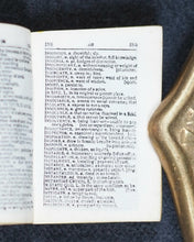 Load image into Gallery viewer, Smallest English Dictionary in the World. MINIATURE BRYCE DICTIONARY IN LOCKET; Publication Date: 1900 CONDITION: VERY GOOD
