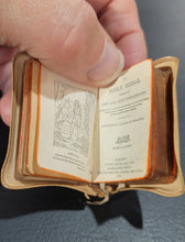 Load image into Gallery viewer, The Holy Bible Containing the Old and New     Testaments Translated out of the Original Tongues...     by His majesty's special command.        OWNED BY NORA BRYCE,

