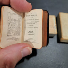 Load image into Gallery viewer, Holy Bible c1914  3/4" x 1 1/4"  Bound in black leather with gilt title to front cover and spine. Gilt edges.  Contained in an unmarked cardboard box
