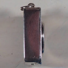 Load image into Gallery viewer, Smallest English Dictionary in the World. Comprising: besides the ordinary and newest words in the language, short explanations of a large number of scientific, philosophical, literary and technical terms. [SOLID SILVER LOCKET].1893. >>MINIATURE BOOK<<
