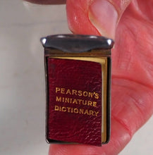 Load image into Gallery viewer, Smallest English Dictionary in the World. Comprising: besides the ordinary and newest words in the language, short explanations of a large number of scientific, philosophical, literary and technical terms. [SOLID SILVER LOCKET].1893. >>MINIATURE BOOK<<

