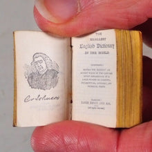 Load image into Gallery viewer, Smallest English Dictionary in the World. Comprising: besides the ordinary and newest words in the language, short explanations of a large number of scientific, philosophical, literary and technical terms. [SOLID SILVER LOCKET].1893. >>MINIATURE BOOK<<
